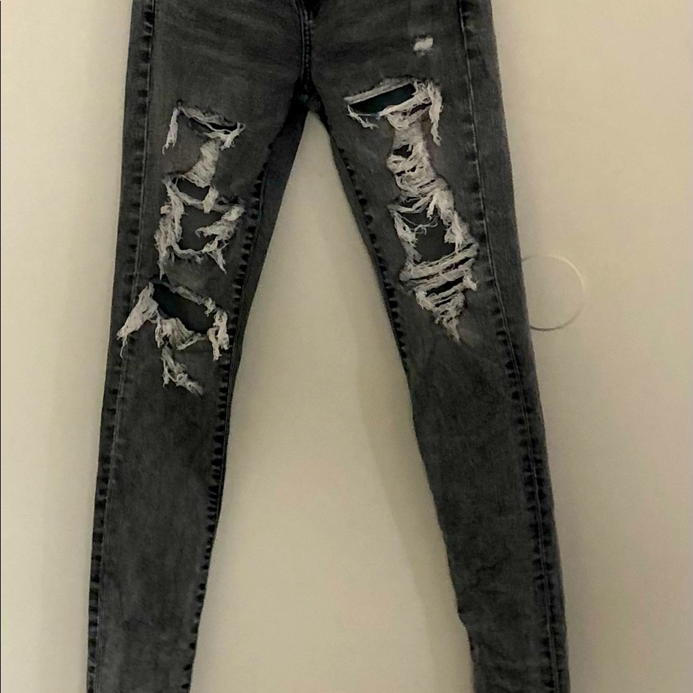 American Eagle next level stretch distressed jeans.